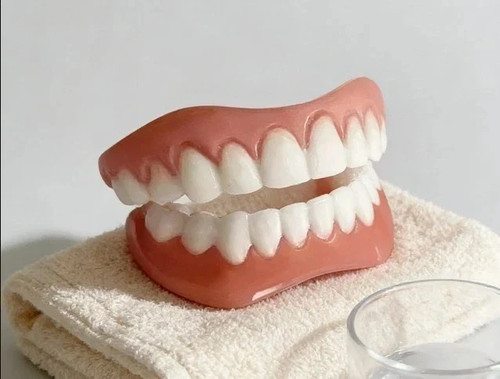 Smile snap false teeth - on,
